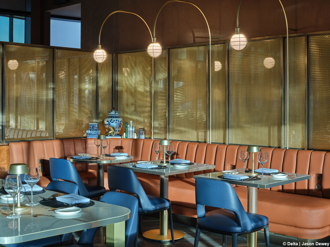 Si ispira alla tradizione marittima di Boston la Delta One Lounge del Logan International: cucina raffinata, design e un’incredibile vista sullo skyline